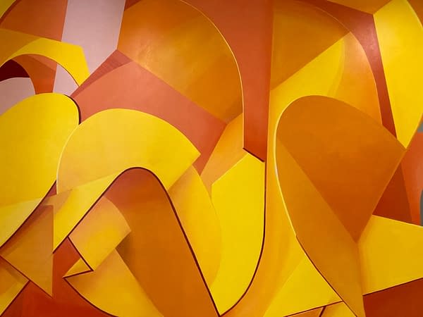 Detail of an interior wall decoration representing an abstraction of Bologna's arcs, Portici in yellow-orange tones. Artwork by Dado.